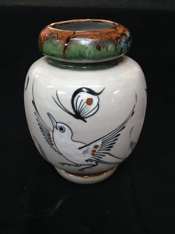 Ken Edwards handcrafted stoneware pottery in an 8 inch by 6” vase.