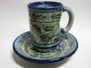 Ken Edwards Collection Espresso Set (CST9S) with blue rim and green, blue and black bird, butterfly, or leaf drawings.