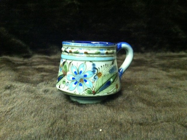 Ken Edwards Pottery Collection series coffee mug with bule rim.