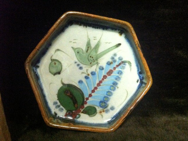 Ken Edwards Pottery Hexagon tray with brown rim and green, blue and white plants and wildlife.