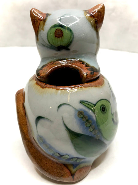 A cat sugar bowl with the head being the lid.