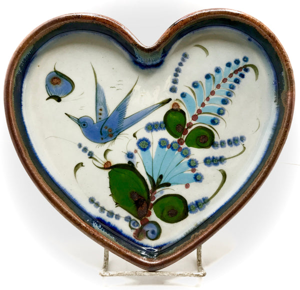 Ken Edwards Pottery tray in the shape of a heart.  Brown rim with bird and butterfly in green and blue.