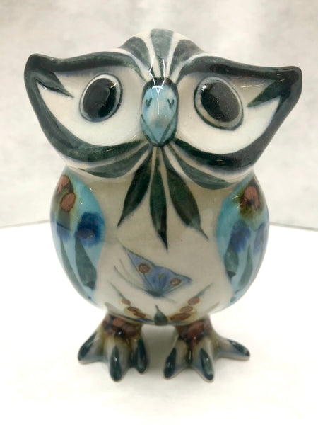 Ken Edwards Pottery owl sculpture in blue, black, green and natural grey clay color.