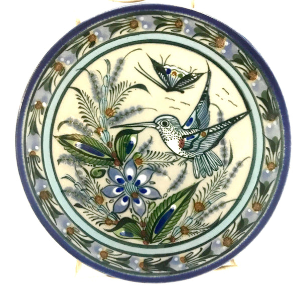 Blue rim with hummingbird inside