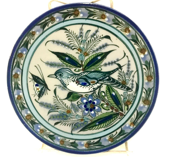 Blue rim with bird inside