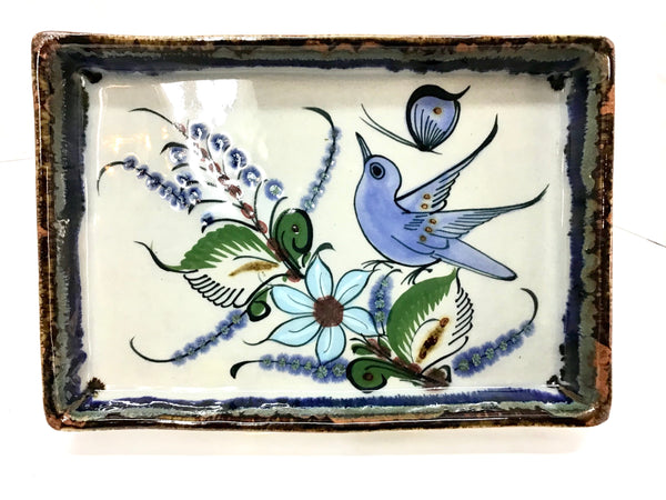 Ken Edwards Pottery rectangular tray with brown rim and bird, butterfly, flower, and leaf designs.