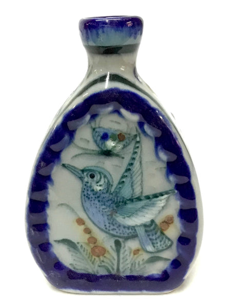 Small vase with blue rim and bird