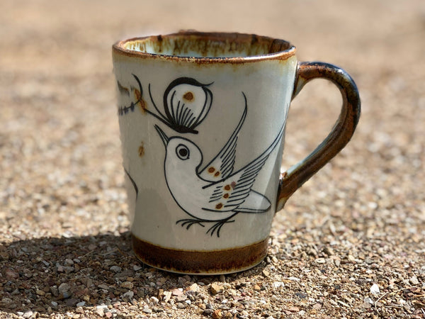 T 10 Ken Edwards mug in stoneware with bird and leaves on exterior.