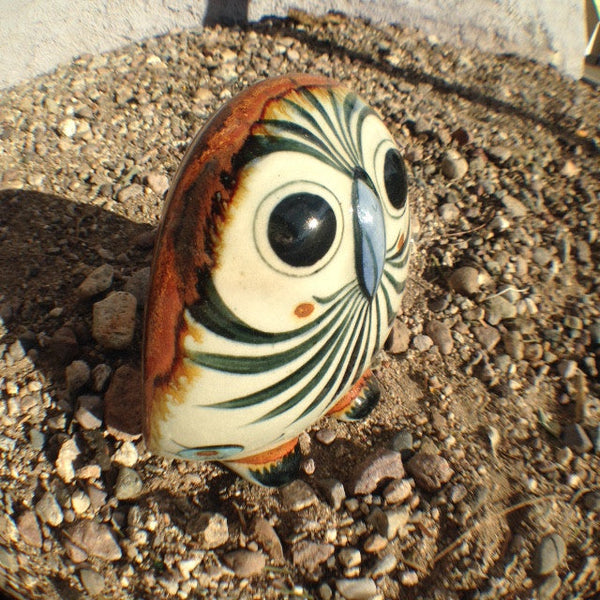 Round face owl in stoneware pottery.